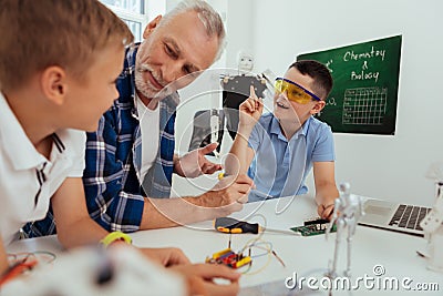 Smart pleasant boy having an idea Stock Photo