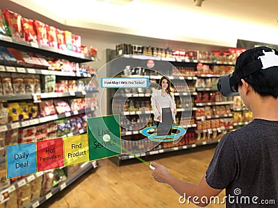 Smart retail with augmented and virtual reality technology concept, Customer use ar and vr glasses to search a daily deal Stock Photo