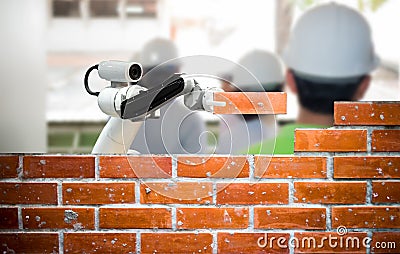 Smart robot industry 4.0 arm brick building construction human force remote Stock Photo