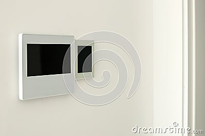 Smart screen with smart home apps on wall. Smart home concept. Stock Photo