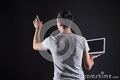 Smart IT specialist using sensory panel Stock Photo