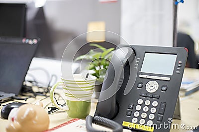 Smart telephone in office , helping necessary thing,phone calls, video calls and having conference and so. Stock Photo