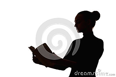 smart woman silhouette reading hobby open book Stock Photo