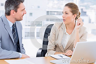Smartly dressed colleagues in business meeting Stock Photo