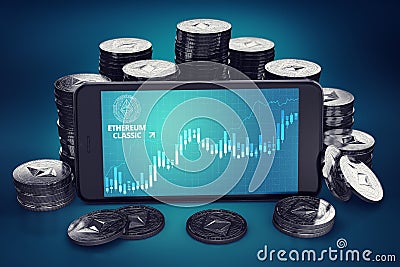 Smartphone with Ethereum Classic ETC growth chart on-screen among piles of Ether coins. Editorial Stock Photo