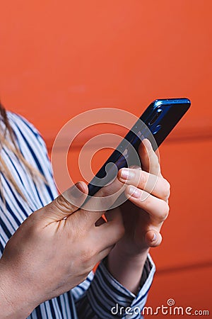 Smartphone in female hands Stock Photo