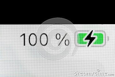 Smartphone full charged battery level indicator - 100 percent: close up macro Stock Photo