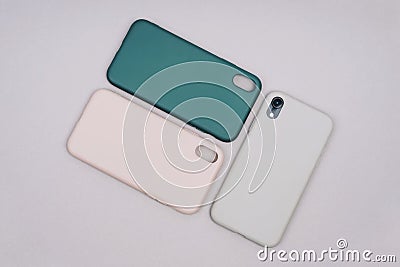Smartphone in a gray silicone case. Protective covers for the smartphone Stock Photo