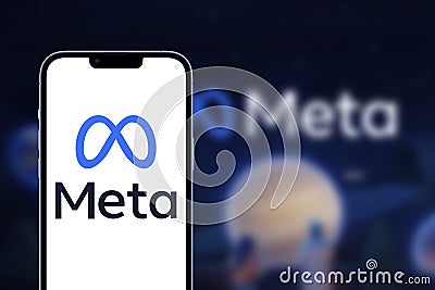 Smartphone with Meta logo or MetaVerse logo Editorial Stock Photo