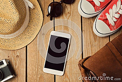 Smartphone mock up template with hipster fashion objects. View from above. Stock Photo