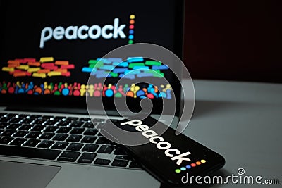 Smartphone with the Peacock logo, is an upcoming video on demand service. Editorial Stock Photo