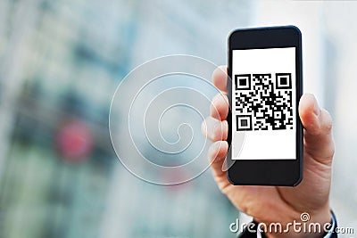 Smartphone with QR code Stock Photo
