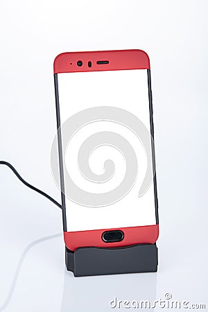 Smartphone in a Recharge Station Stock Photo