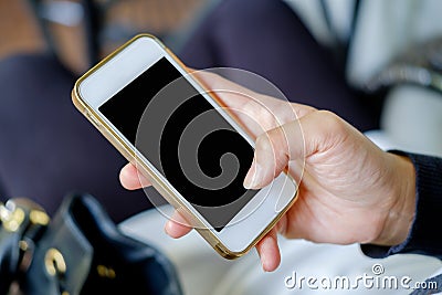 Smartphone in right hand. Stock Photo