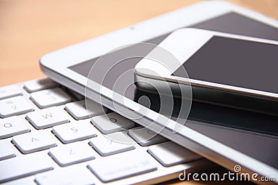 Smartphone, tablet and keyboard Editorial Stock Photo