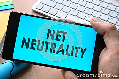 Smartphone with words net neutrality. Stock Photo