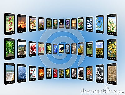 Smartphones with different photo in rows. Digital technologies Stock Photo