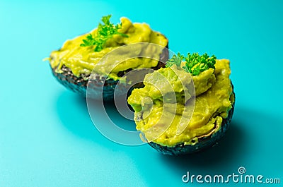 Smashed avocado, smother avocado with lemon juice served on the for brunch Stock Photo