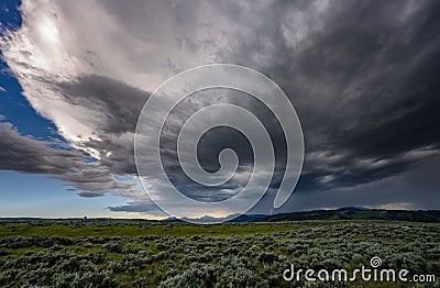 Smearing Clouds of Storm Clouds with Lightening Strike Stock Photo