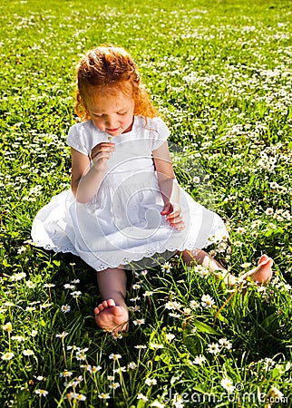 Smelling flowers Stock Photo