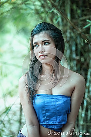 Smile ancient Thai Woman In Traditional Costume Of Thailand Stock Photo