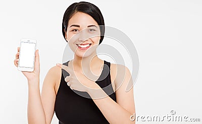 Smile asian girl show empty blank screen mobile phone - pointed on empty display device Stock Photo