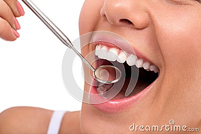 Smile with dentist mirror Stock Photo