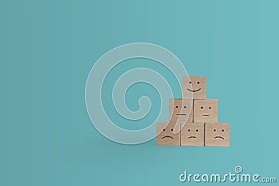 Smile face and cart icon on wood cube. Optimistic person or people feeling inside and service rating when shopping satisfaction Stock Photo