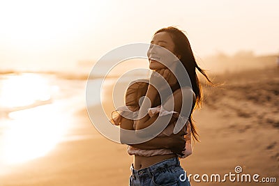 Smile Freedom and happiness chinese woman on beach. Stock Photo