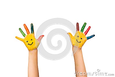 Smile, happiness and fun concept. Happy kid shows painted hands Stock Photo