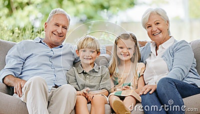 Smile, portrait and children with grandparents on a sofa in the living room of modern family home. Happy, love and young Stock Photo