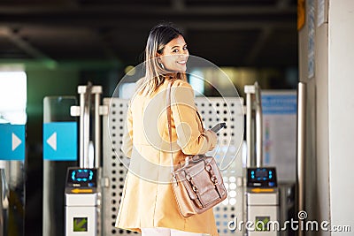 Smile, portrait and a woman with access to a station for travel, transport or or a train. Happy, airport and a girl or Stock Photo