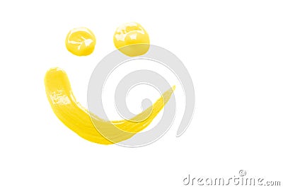 Smile shape - cosmetic sample isolated on white. Trendy yellow color of the year 2021 - Illuminating Stock Photo