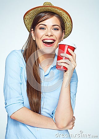 Smile with teeth. Beautiful happy woman posing with coffee cup. Stock Photo
