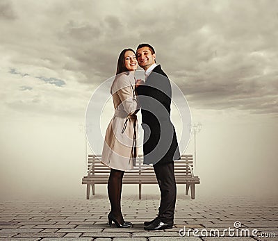 Smiley couple flirting and embracing Stock Photo