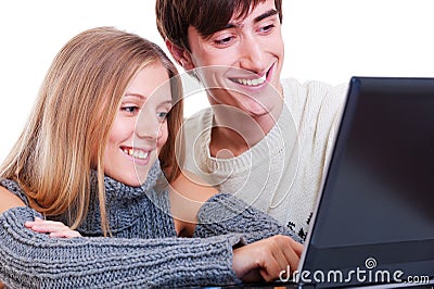 Smiley couple with laptop Stock Photo