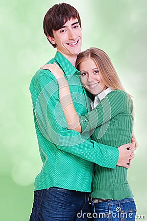 Smiley couple over green Stock Photo