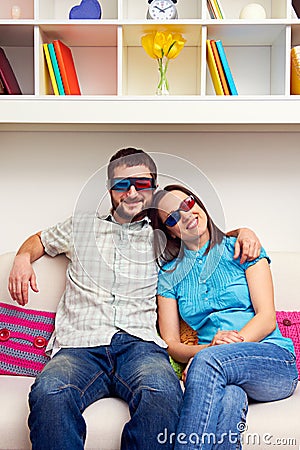 Smiley couple in stereo glasses Stock Photo