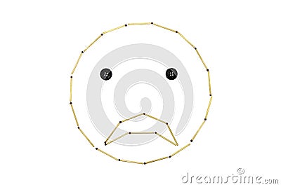 Smiley face disappointment is made out of matches Stock Photo