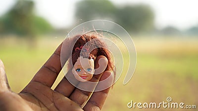 Smiley face of Rubber baby doll. Doll for kids and childhood enjoyment. Childhood life and playing tools concept Stock Photo