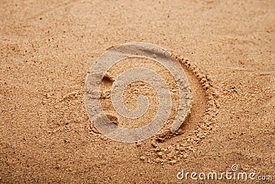 Smiley picture on a beach sand Stock Photo