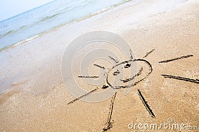 Smiley Sun On The Beach Stock Photo