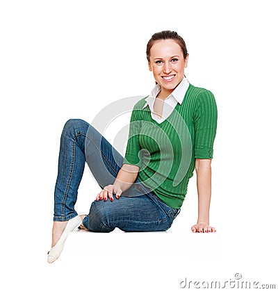 Smiley young woman sitting Stock Photo