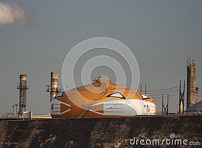 Smilin` Jack, world`s largest jack o`lantern, wears a face mask during Covid 19 epidemic, Los Angeles Editorial Stock Photo