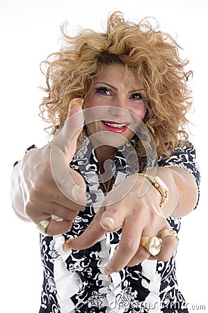 Smiling adult female pointing you Stock Photo