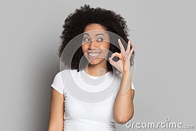 Smiling african American girl show all right gesture Stock Photo