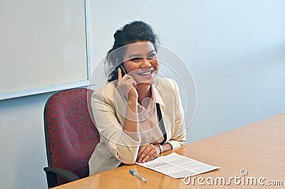 Business woman call to inquire more details and talk Stock Photo