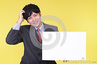 Smiling Asian businessman Stock Photo