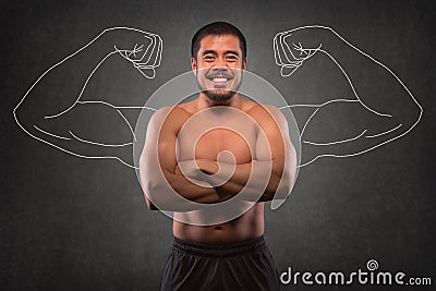 Smiling asian man with muscular upper body in front of muscle arms background. Fitness, workout and training concept Stock Photo