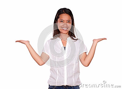 Smiling asiatic woman holding out her palms Stock Photo